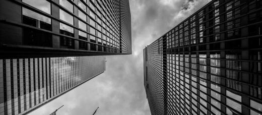 Cluster of commercial towers photographed from street level