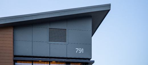 Modern building corner with a clean panelised elevation